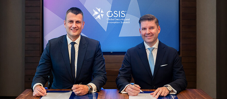 Dr. Bastian Giegerich and Heiko M. Stutzinger Dr. Bastian Giegerich, Director-General and Chief Executive of IISS, and Heiko M. Stutzinger standing side by side, looking into the camera.